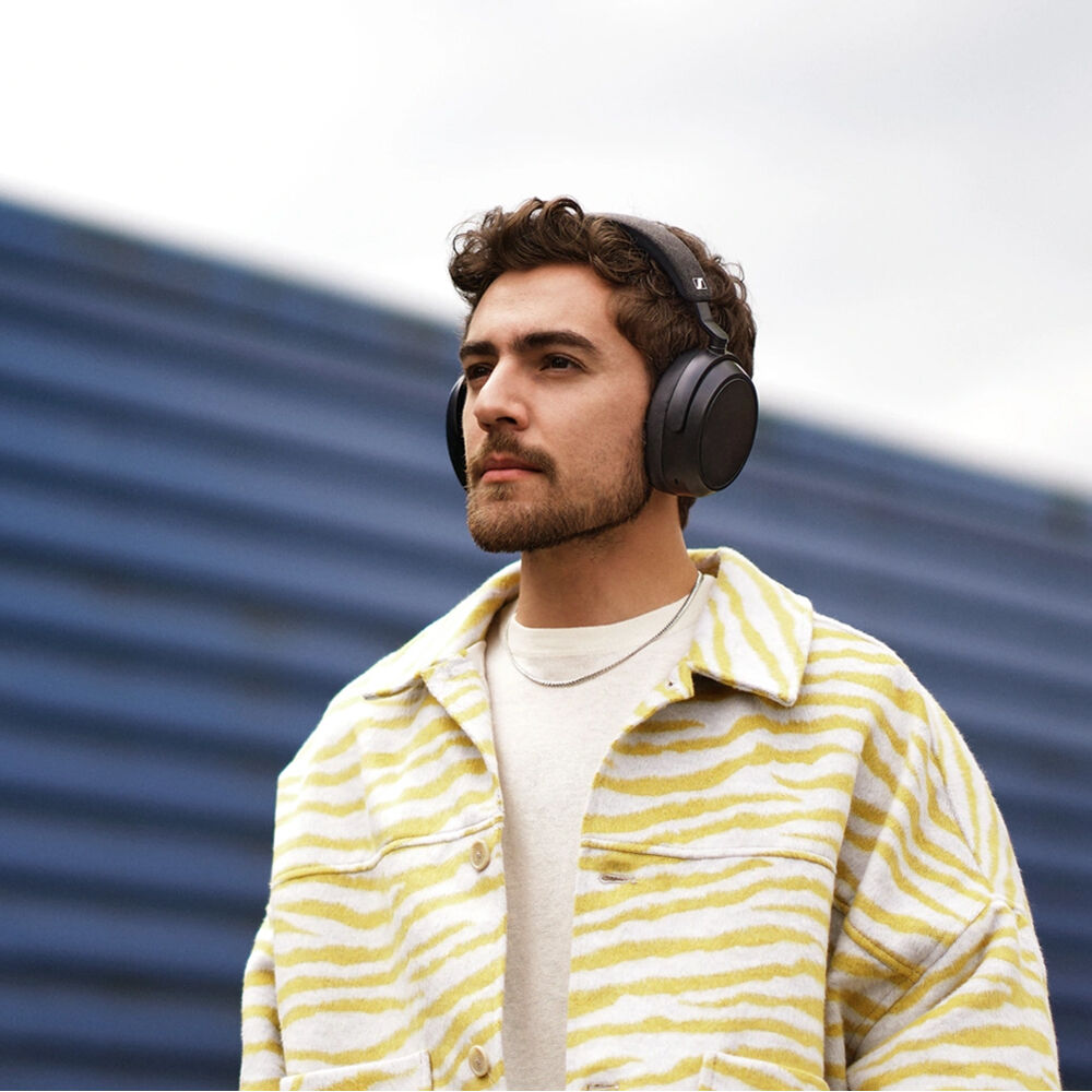 Sennheiser Momentum 4 Wireless headphones with over-ear design, black finish, and cushioned ear cups for comfortable listening.