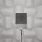Teenage Engineering CM-15 condenser microphone with sleek design and professional audio capturing capabilities.