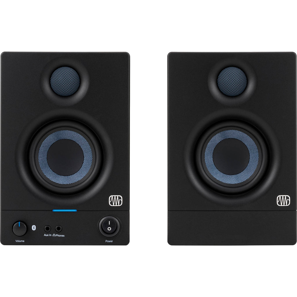 Presonus Eris 3.5 BT 2nd Gen active nearfield studio monitors shown on a desk with a white background.