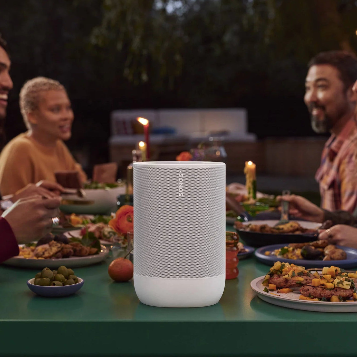 Sonos Move 2 portable speaker in black, showing its compact design and control buttons on the top.