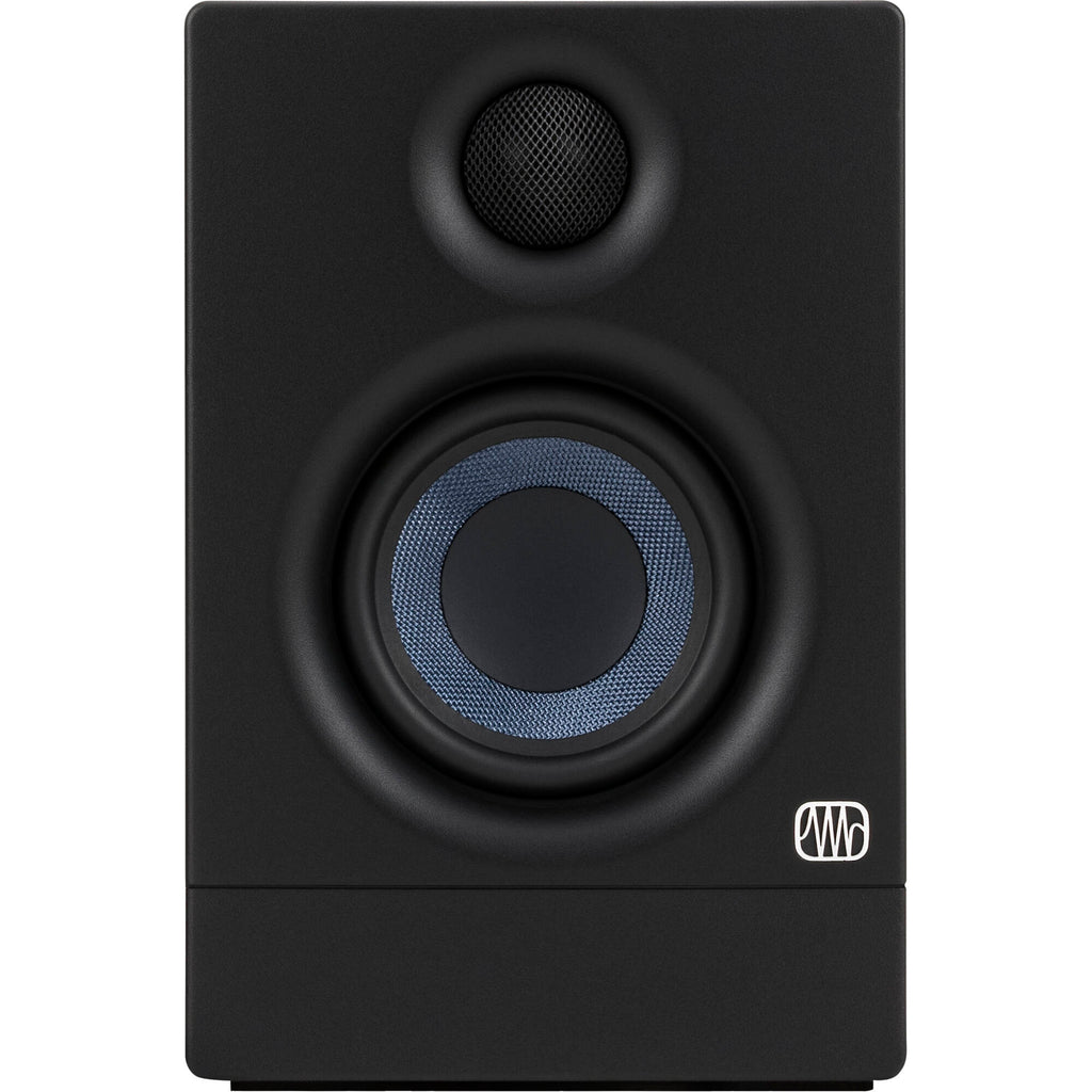 Presonus Eris 3.5 2nd Gen desktop speakers shown on a desk with a modern setup for accurate audio playback.