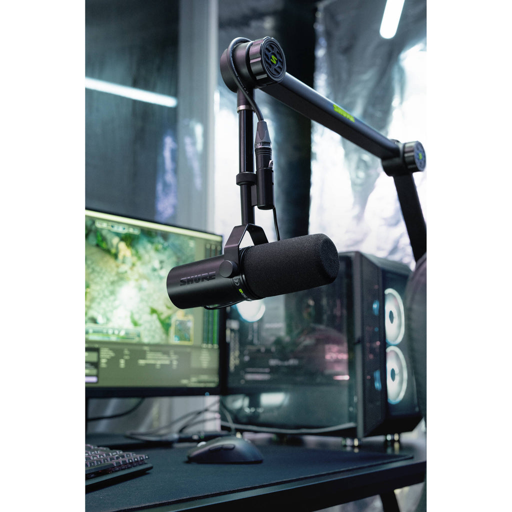 Shure SM7dB dynamic microphone with foam windscreen and mount, designed for professional broadcasting and studio recording.