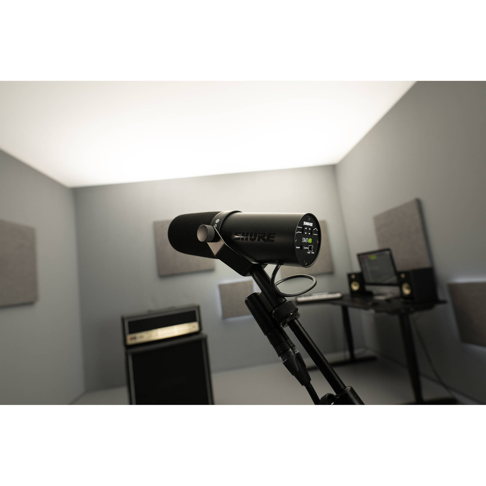 Shure SM7dB dynamic microphone with black body and grille, ideal for studio recording and broadcasting.