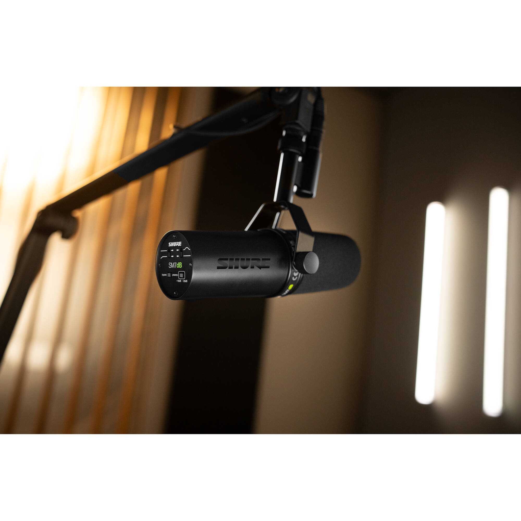 Shure SM7dB dynamic microphone with a black body and grille, used for professional audio recording and broadcasting.