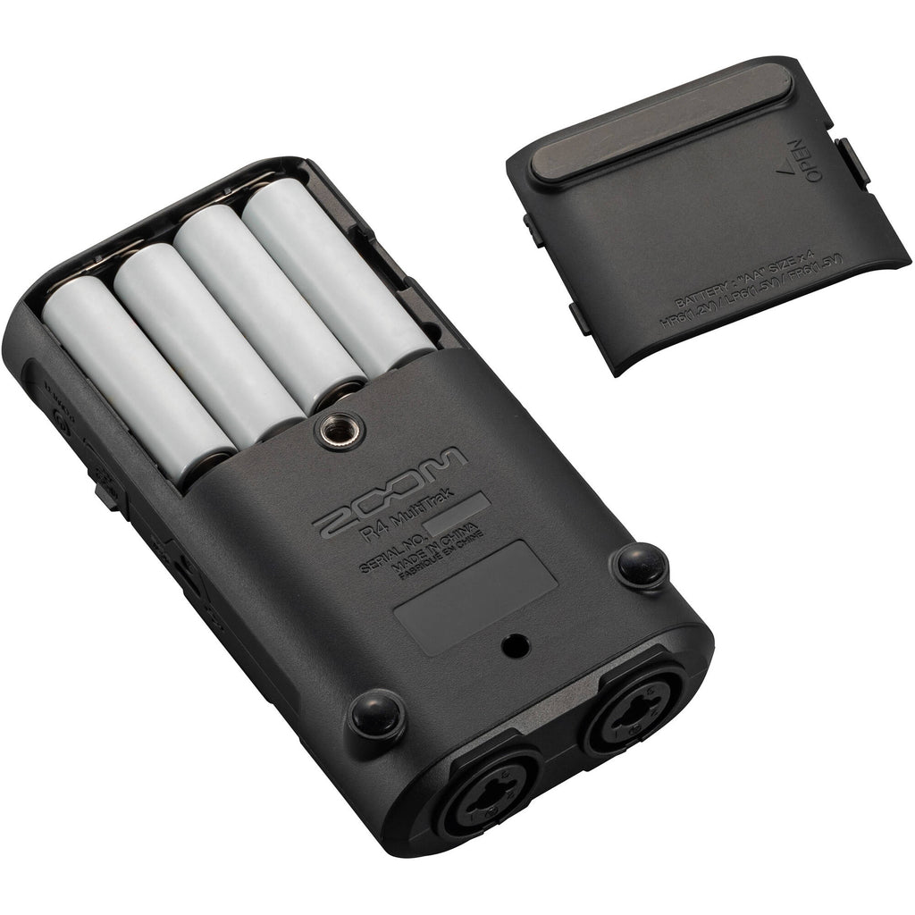 Zoom R4 MultiTrak digital recorder showing multiple input channels, controls, and built-in microphone on a sleek black device.