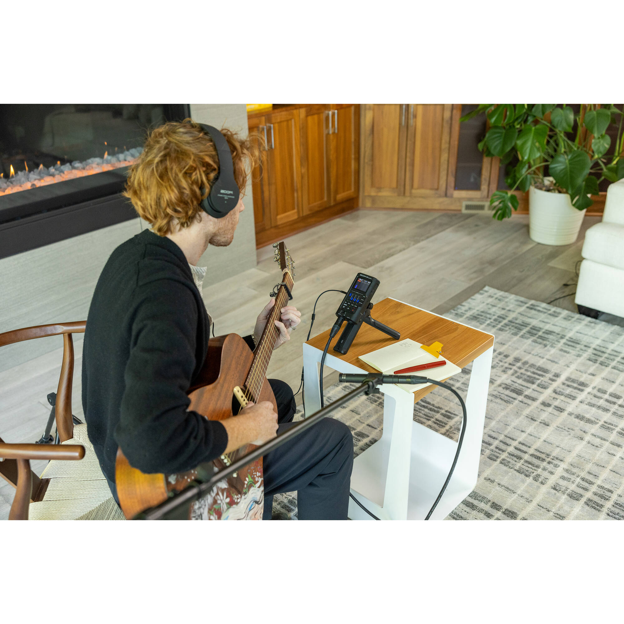 Zoom R4 MultiTrak digital recorder with multiple input jacks, LCD screen, and control knobs for portable audio recording.