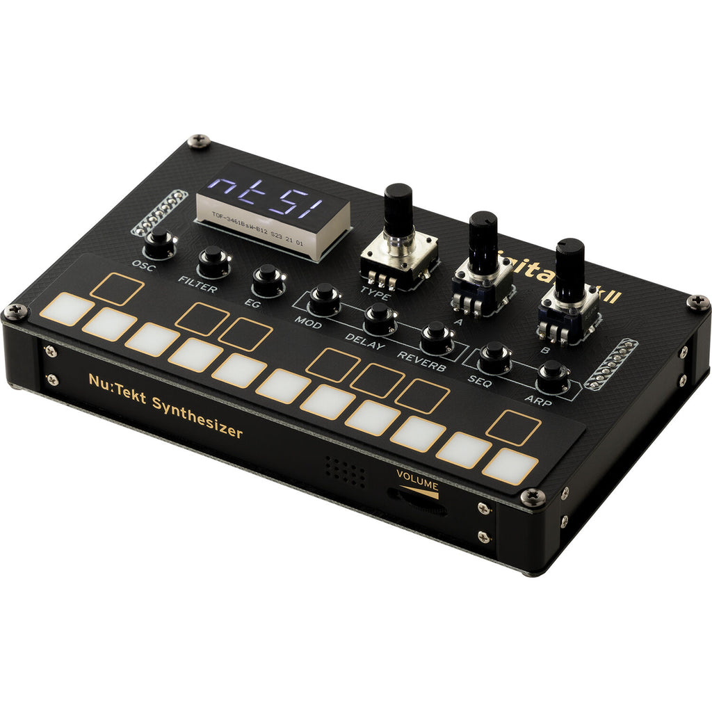 Korg Nu:Tekt NTS-1 MK2 digital synthesizer kit, compact tabletop synthesizer with built-in display and control knobs.
