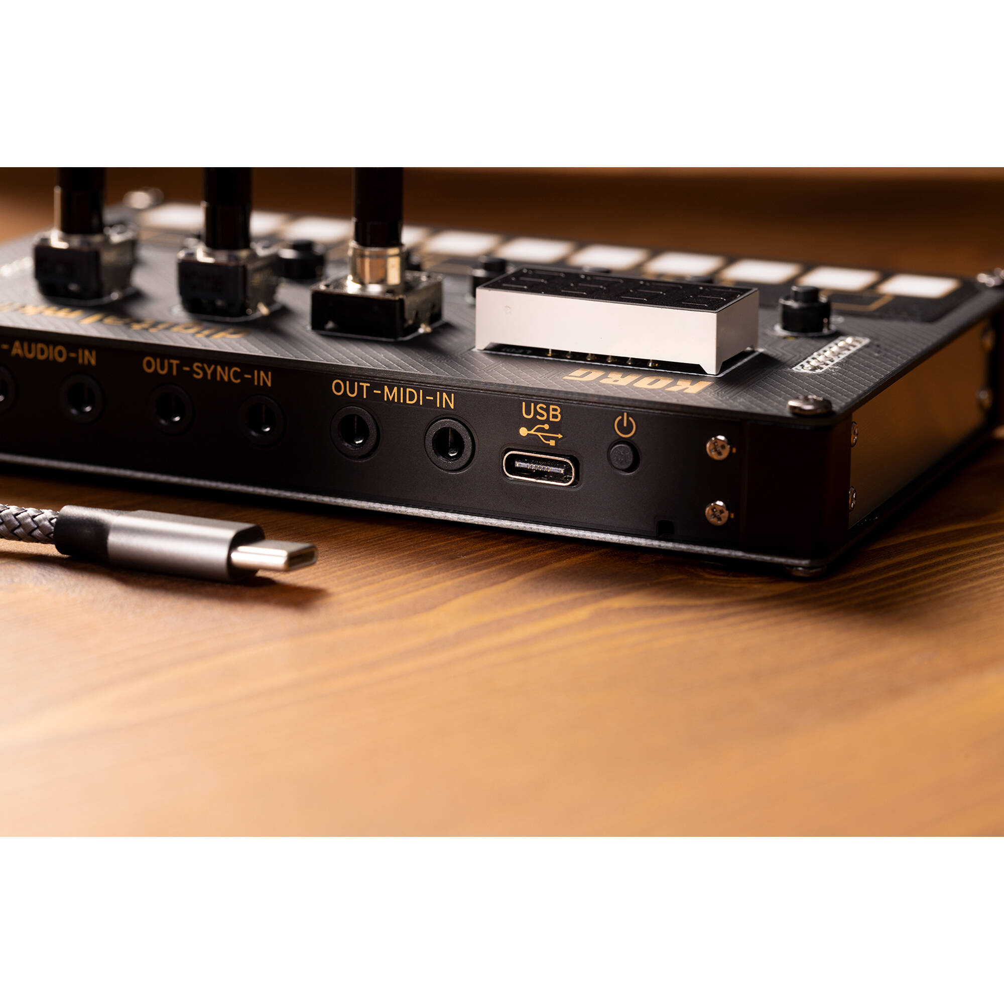 Korg Nu:Tekt NTS-1 Digital Kit MK2 synthesizer in black with control knobs and keyboard keys, ready for music creation.