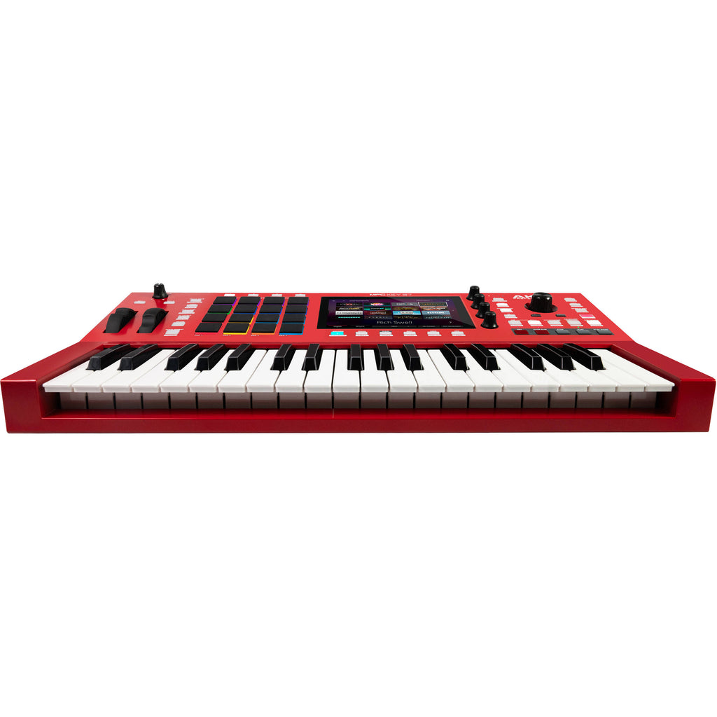Akai Professional MPC Key 37 MIDI controller with red finish, featuring keys, knobs, and pads for music production and sampling.