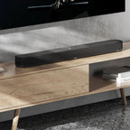 Sennheiser Ambeo Soundbar Plus showcasing sleek black design with multiple speaker drivers and control buttons on top.