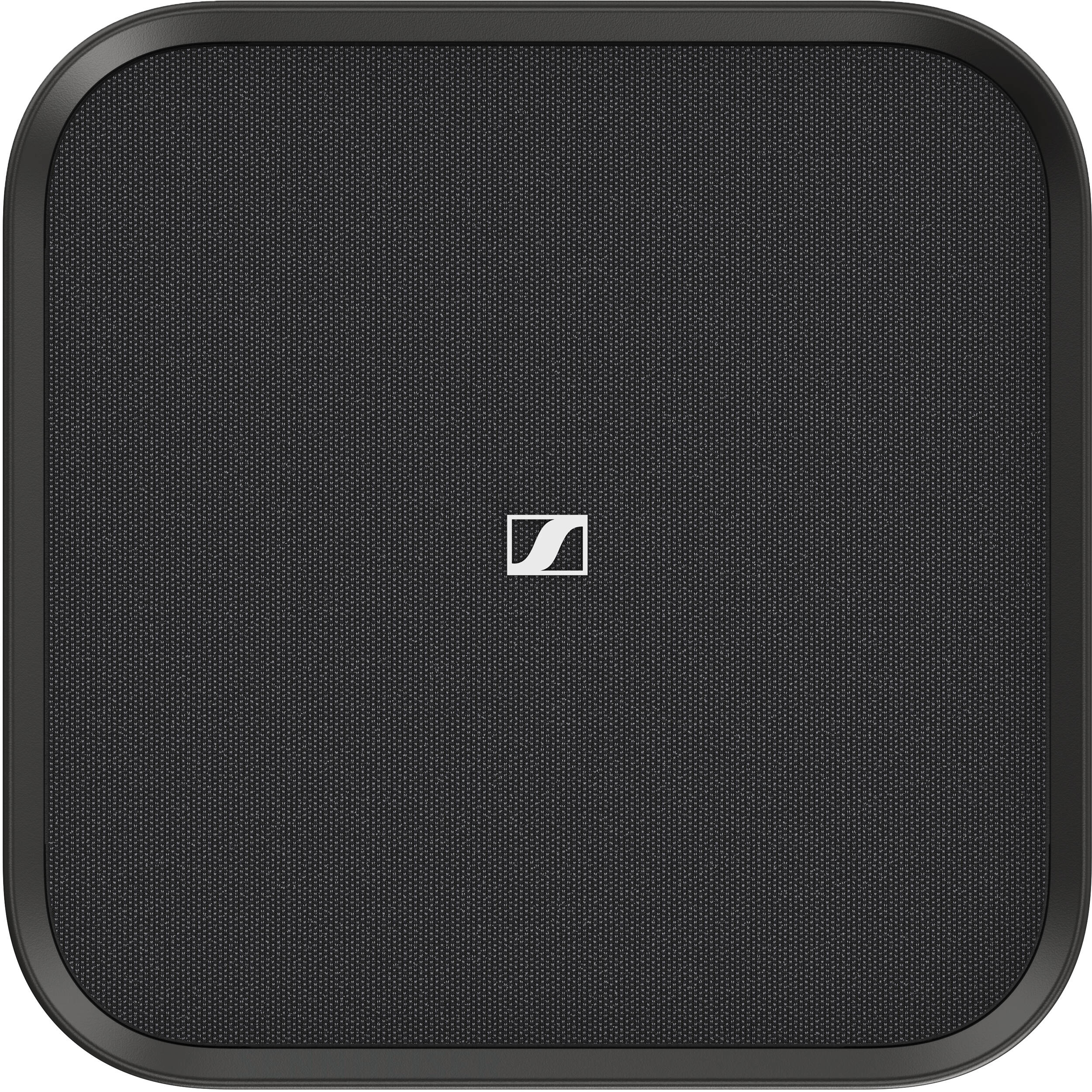 Sennheiser Ambeo Subwoofer showing a sleek black subwoofer with control panel and connections in a modern home audio setup.
