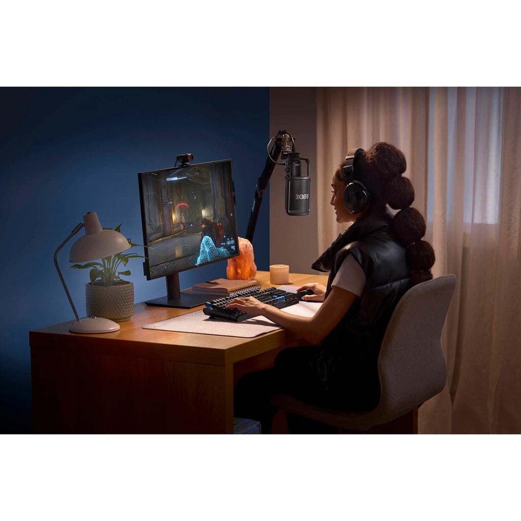 Rode NT-USB+ USB microphone with built-in stand and controls, ideal for podcasting, streaming, and recording at a desk.