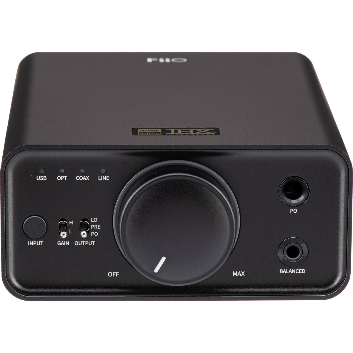 FiiO K7 headphone amplifier and DAC with sleek black design and multiple input ports on a white background.
