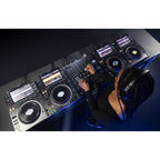 Pioneer DJM-A9 DJ mixer with multiple knobs, faders, and input channels for professional audio mixing.