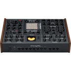 Erica Synths SYNTRX II desktop synthesizer with knobs, buttons, and patch points on a black module with colorful accents.