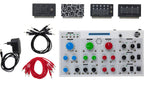 Erica Synths Bullfrog desktop synthesizer with knobs, patch points, and a compact black metal case.
