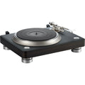 Denon DP-3000NE turntable with wooden plinth, tonearm, and vinyl record, showcasing high-quality audio equipment design.