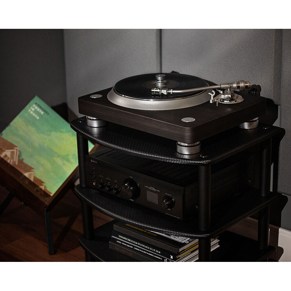 Denon DP-3000NE turntable with wooden plinth, tonearm, and stylus, showcasing a sleek, modern design for high-quality vinyl playback.