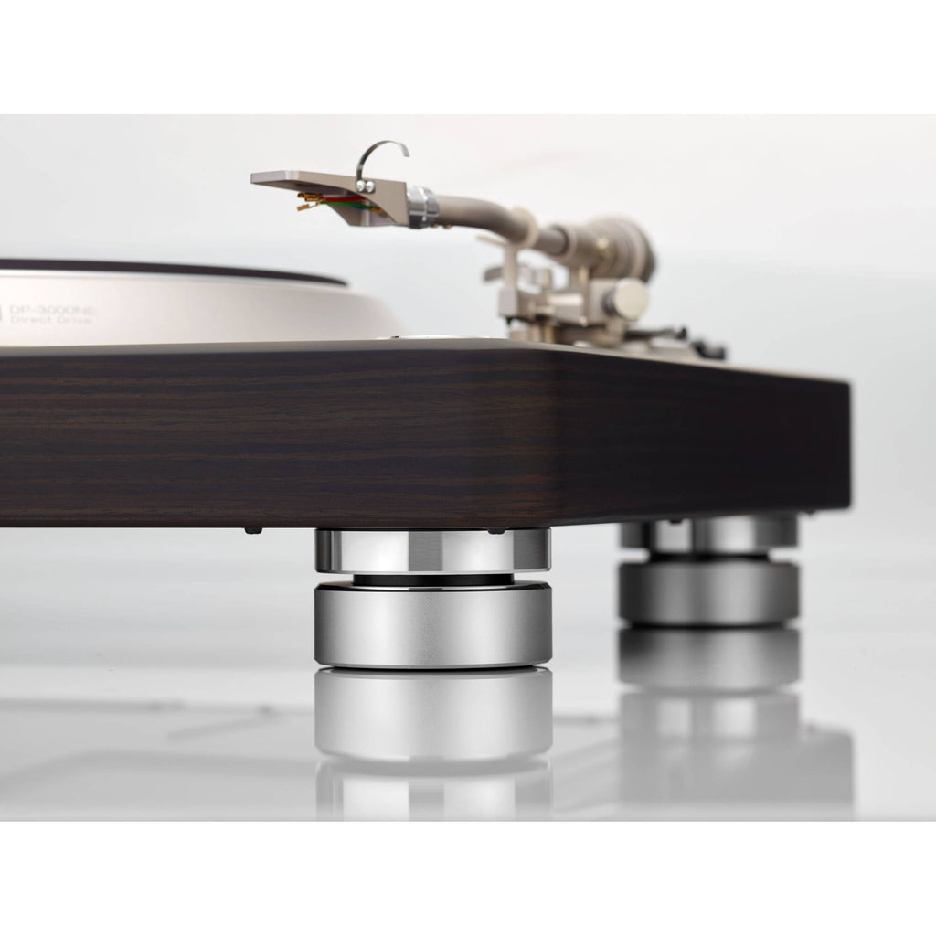 Denon DP-3000NE turntable with a sleek black finish, featuring a tonearm and platter for high-quality vinyl playback.