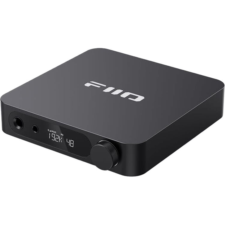 FiiO K11 headphone amplifier and DAC with sleek black design, multiple input ports, and digital display on the front panel.