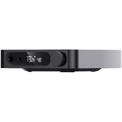 FiiO K11 headphone amplifier and DAC with sleek design and multiple input ports, showcasing high-quality audio equipment.