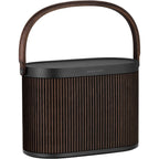 Bang & Olufsen Beosound A5 portable speaker with sleek design and fabric cover, featuring control buttons on top.