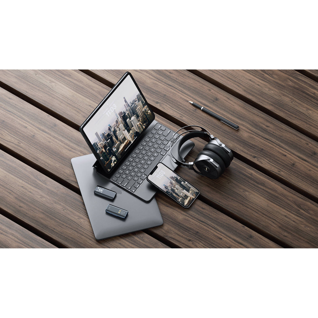 FiiO BTR15 headphone amplifier and DAC device with black and silver design, compact and portable for high-quality audio enhancement.