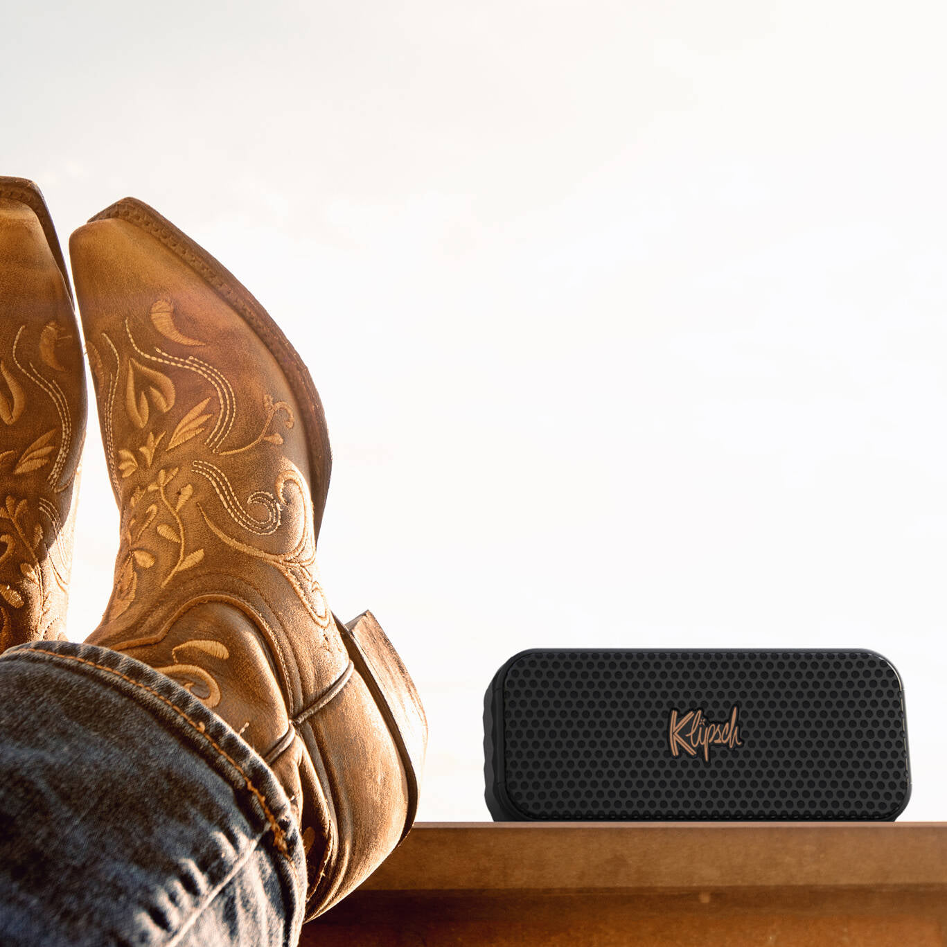 Klipsch Nashville portable speaker with sleek black design, compact size, and textured exterior for high-quality sound.