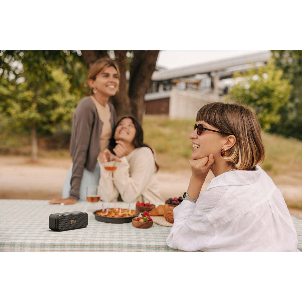 Klipsch Nashville portable speaker with sleek design and control buttons, perfect for portable audio enjoyment.