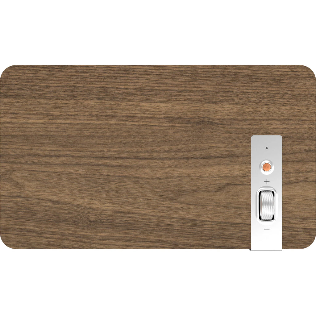 Wireless Klipsch The Three Plus speaker with wooden cabinet and control knobs, showcasing modern audio design.