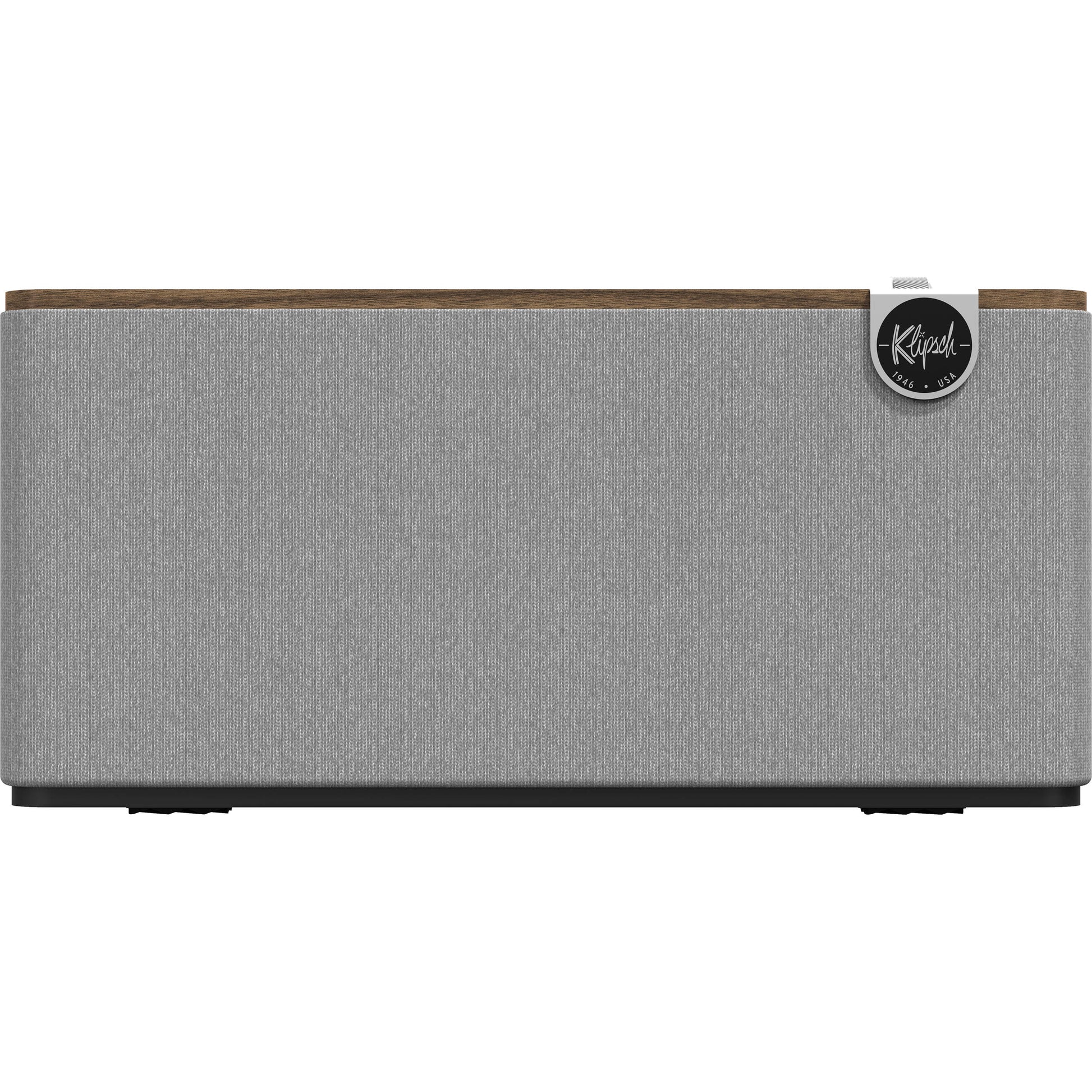 Klipsch The Three Plus wireless speaker with wooden cabinet, control knobs, and fabric grille, showcasing a sleek retro design.