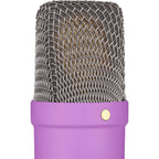 Rode NT1 Signature Series condenser microphone with black finish and gold accents, positioned on a stand for studio recording setup.
