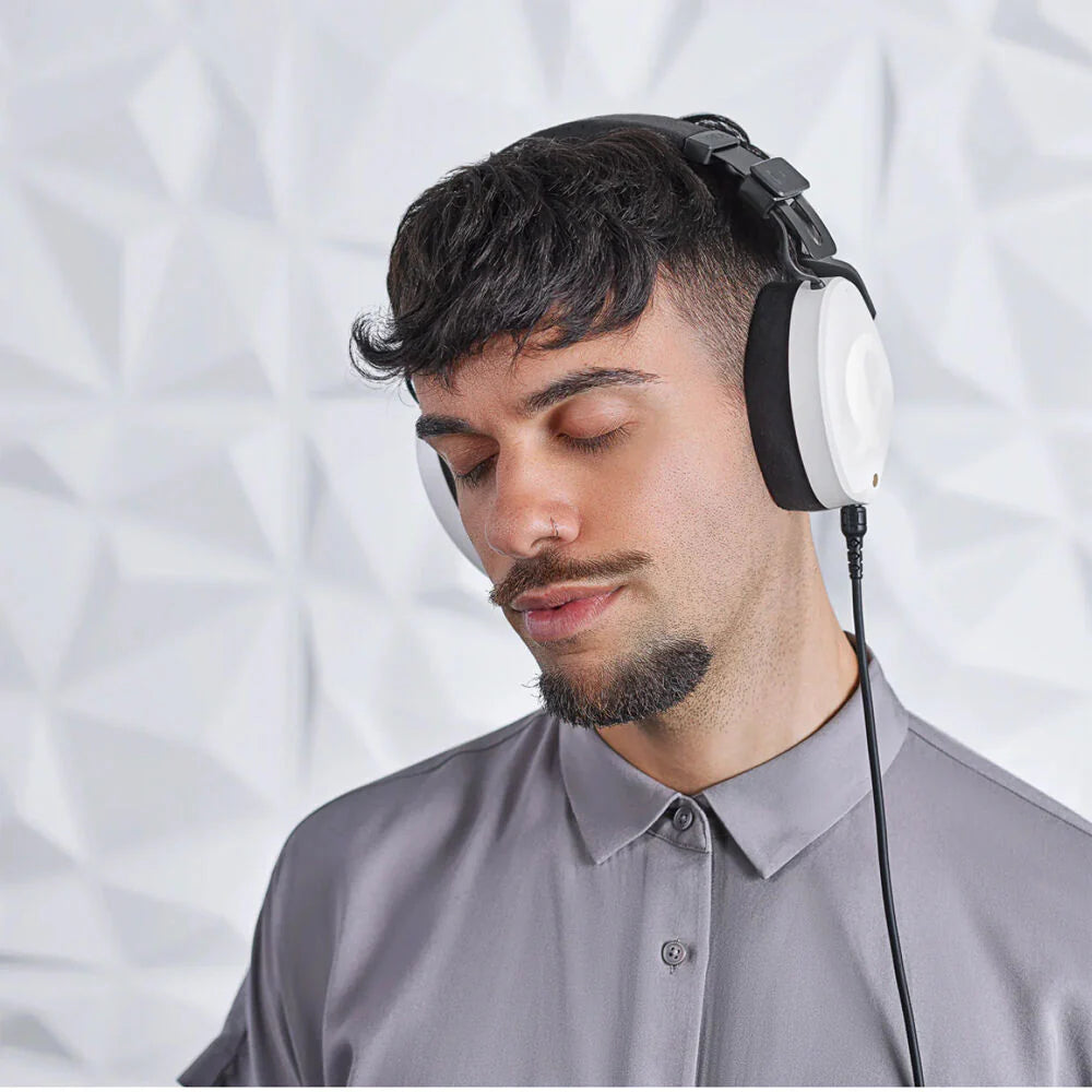 Rode NTH-100 studio headphones with over-ear design, black cushions, and adjustable headband for professional audio monitoring.