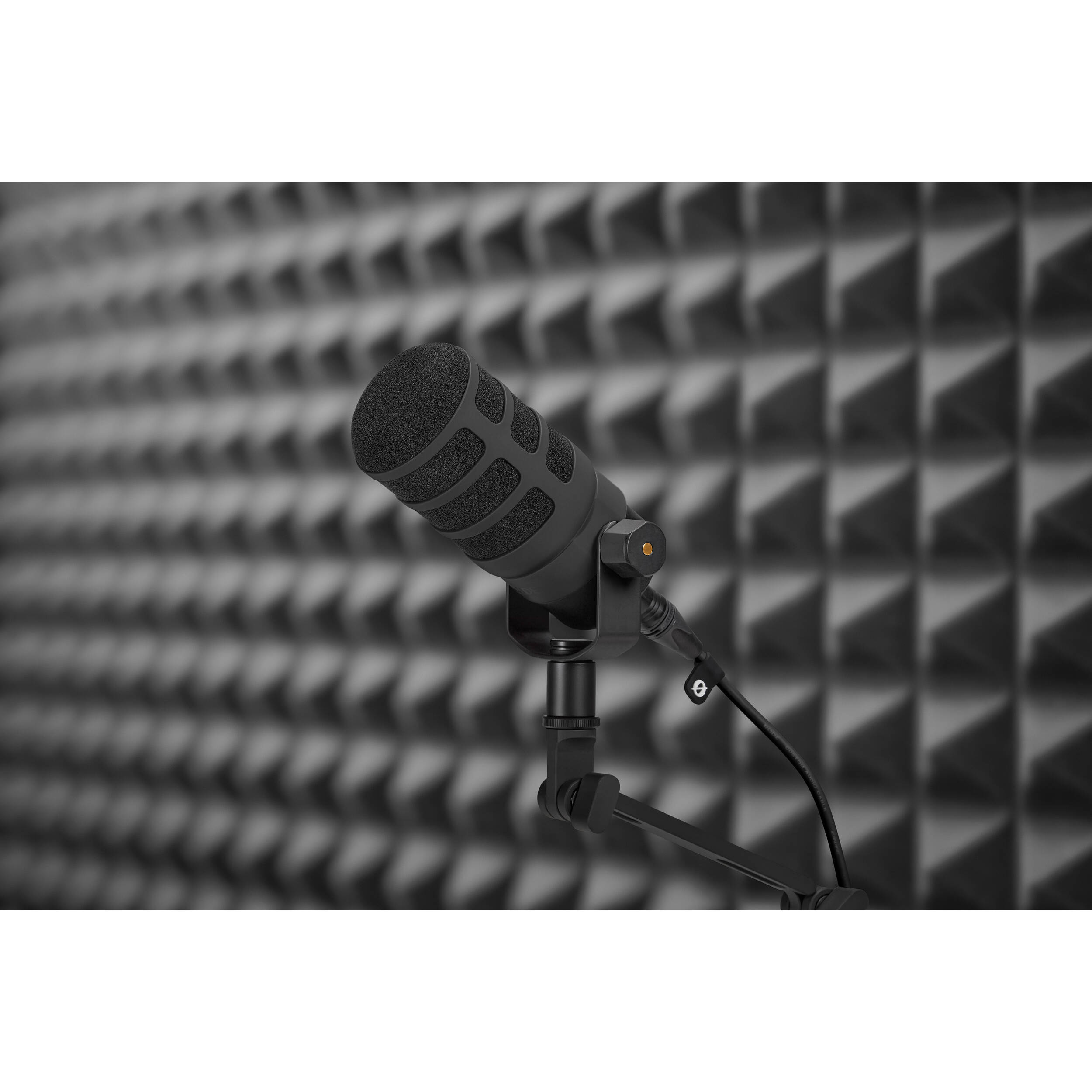 Rode WS14 Pop Filter for PodMic microphone, round foam windscreen for reducing plosive sounds during recording.