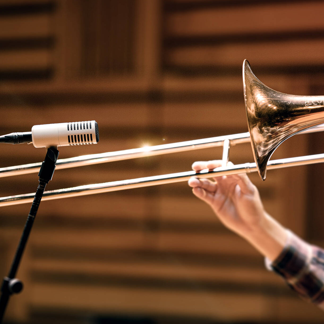 Universal Audio SD-7 dynamic microphone shown with professional design and grille, ideal for studio and live sound applications.