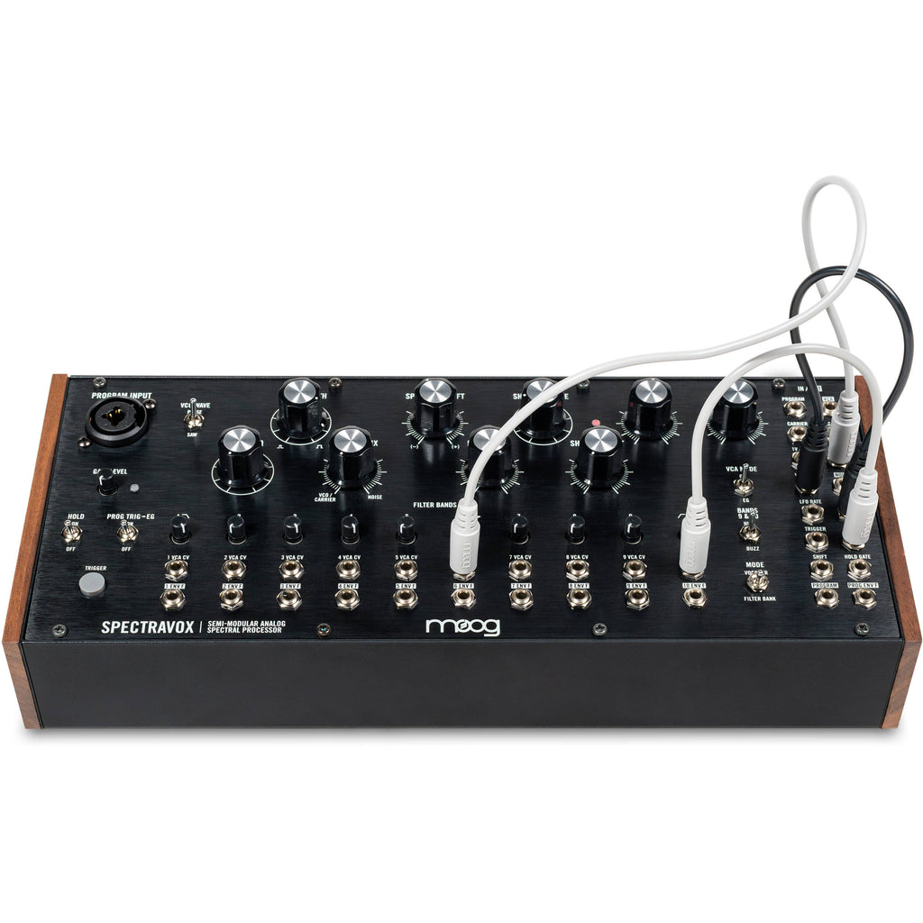 Moog Spectravox synthesizer with control panel and knobs, showcasing vintage-style electronic music equipment.