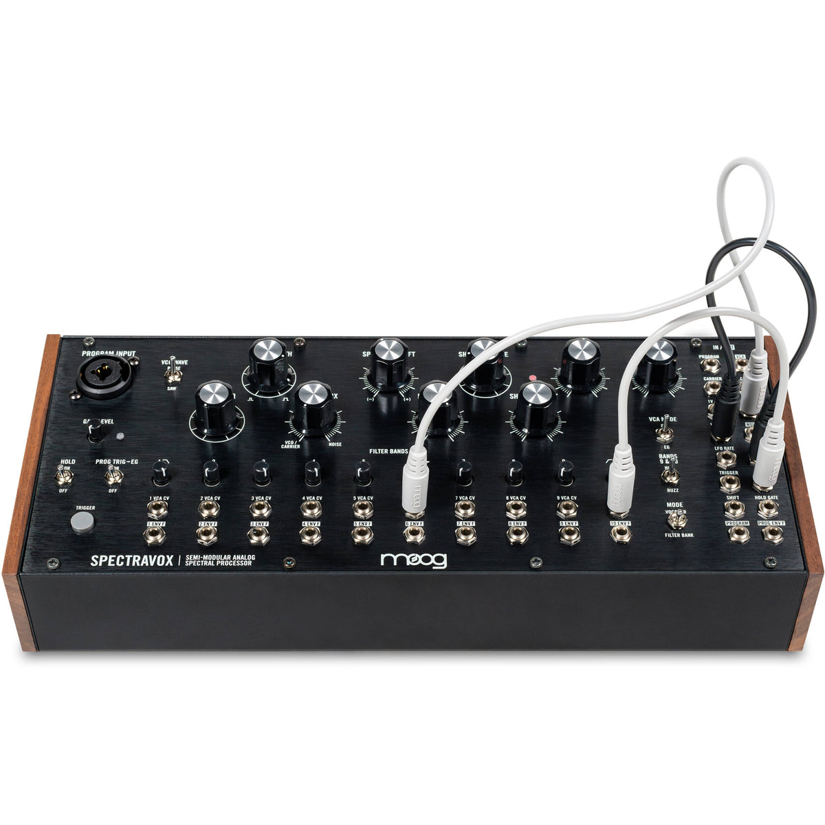Moog Spectravox synthesizer with control panel and knobs, showcasing vintage-style electronic music equipment.