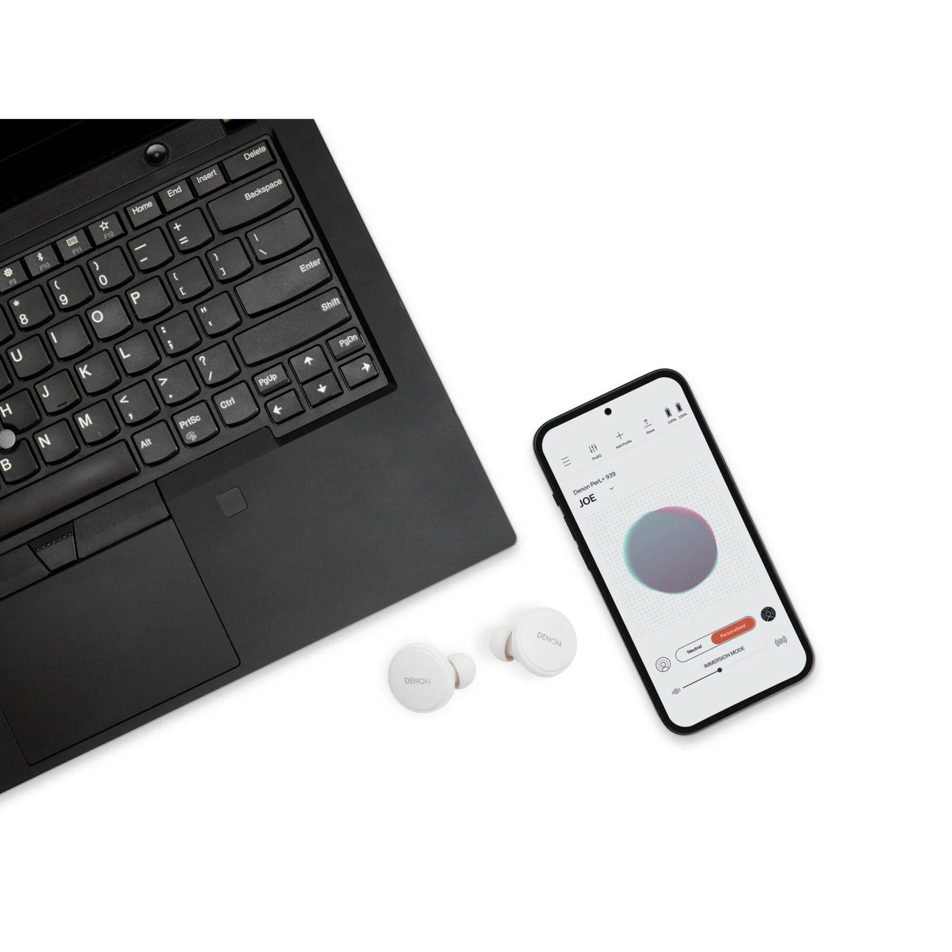 Wireless in-ear headphones from Denon PerL PRO with sleek black earbuds and in-line controls.