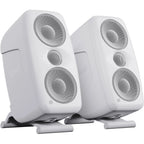 IK Multimedia iLoud MTM MK2 active nearfield monitors with black speaker enclosures and control knobs on the front panel.