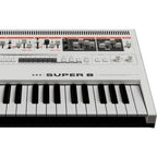 UDO Audio Super 8 synthesizer with multiple control knobs and vintage-style design, showcasing its front panel and keyboard.