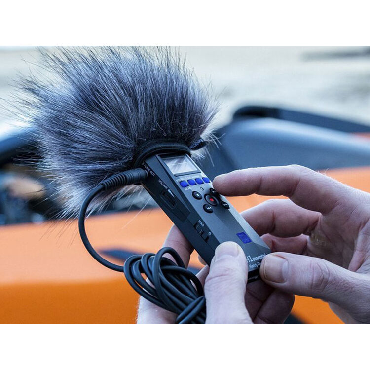 Zoom APH-1e digital recorder accessory with built-in microphones and control buttons for high-quality audio recording.