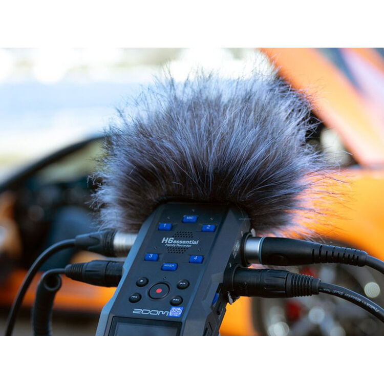 Zoom APH-6e digital recorder with multiple input options and compact design, shown in a close-up image.