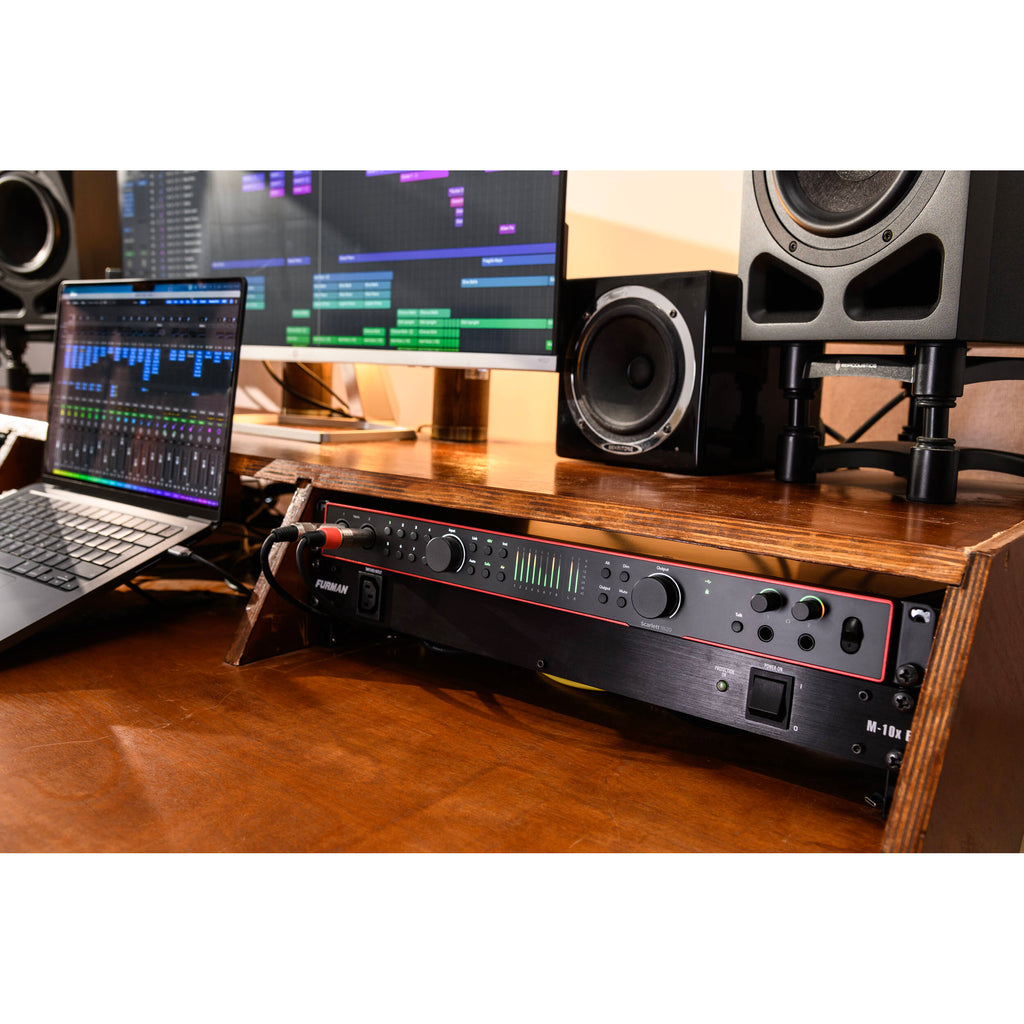 Focusrite Scarlett 18i20 4th Gen audio interface with multiple input and output ports, compact design, and professional-grade audio equipment.