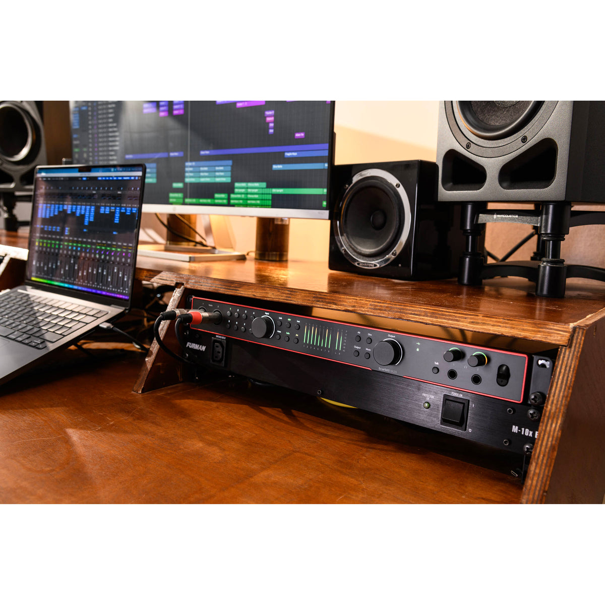 Focusrite Scarlett 18i20 4th Gen audio interface with multiple input and output ports, compact design, and professional-grade audio equipment.