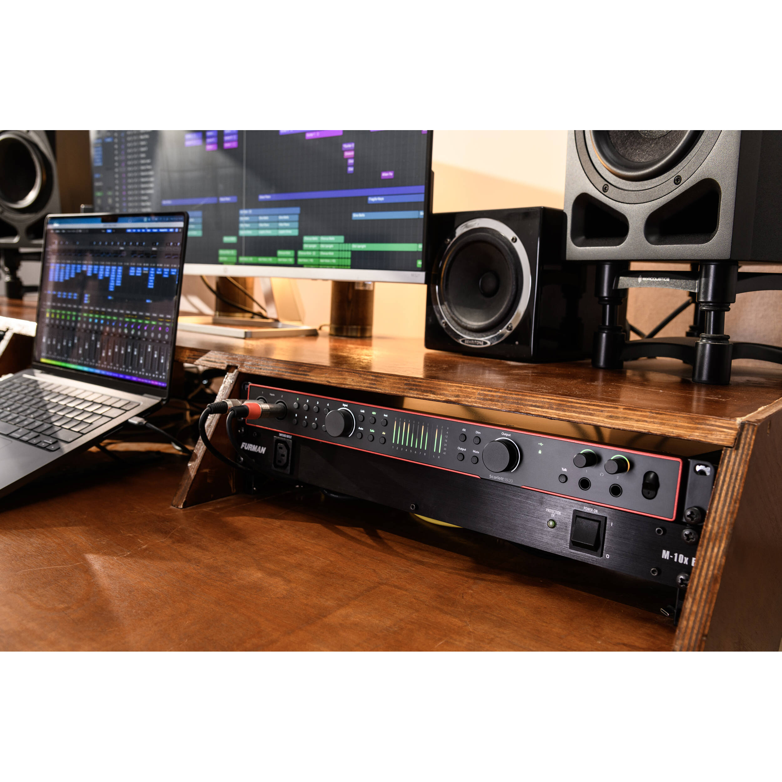 Focusrite Scarlett 18i20 4th Gen audio interface with multiple input and output ports, compact design, and professional-grade audio equipment.