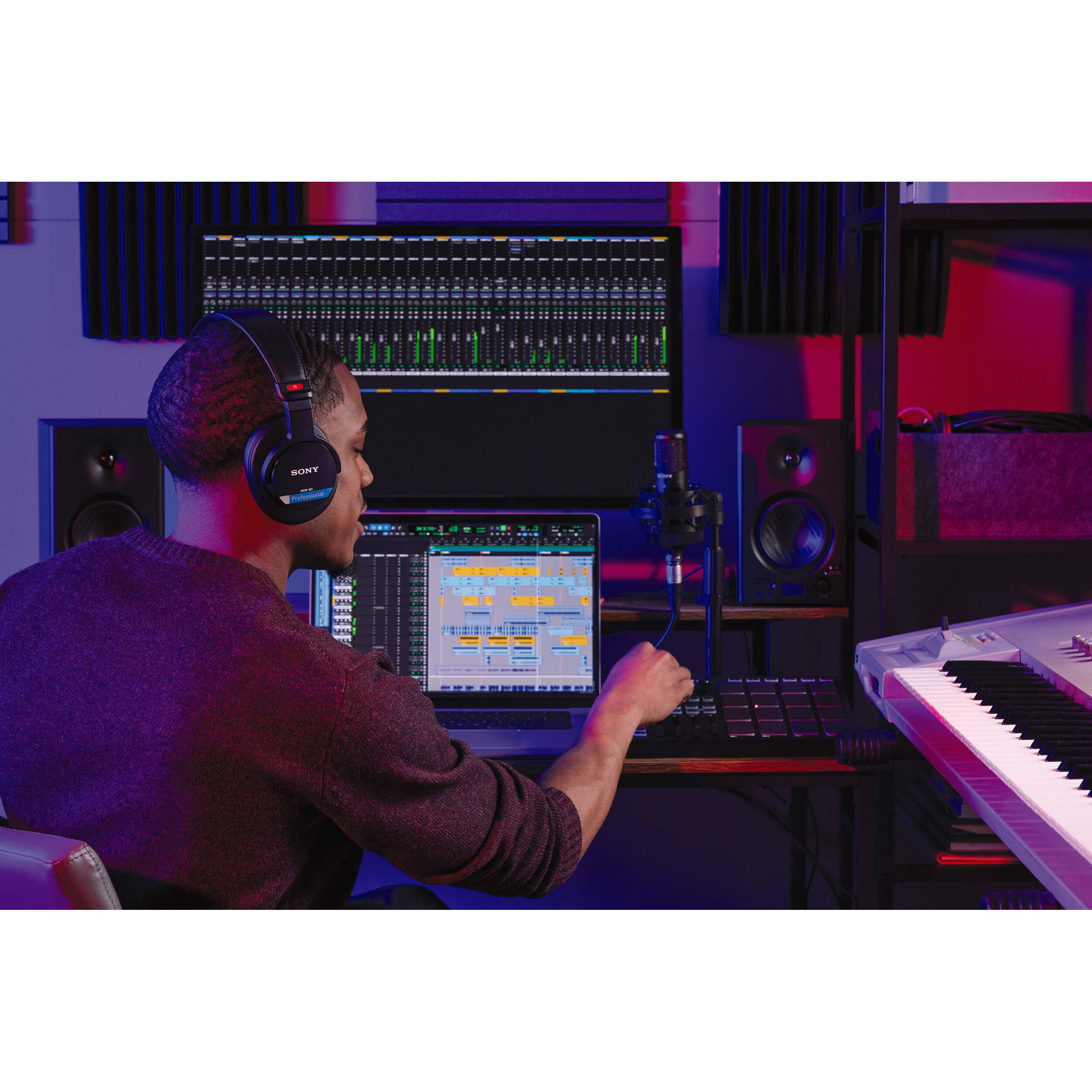 Sony MDR-M1 studio headphones with over-ear design, black finish, and cushioned ear cups for professional audio listening.