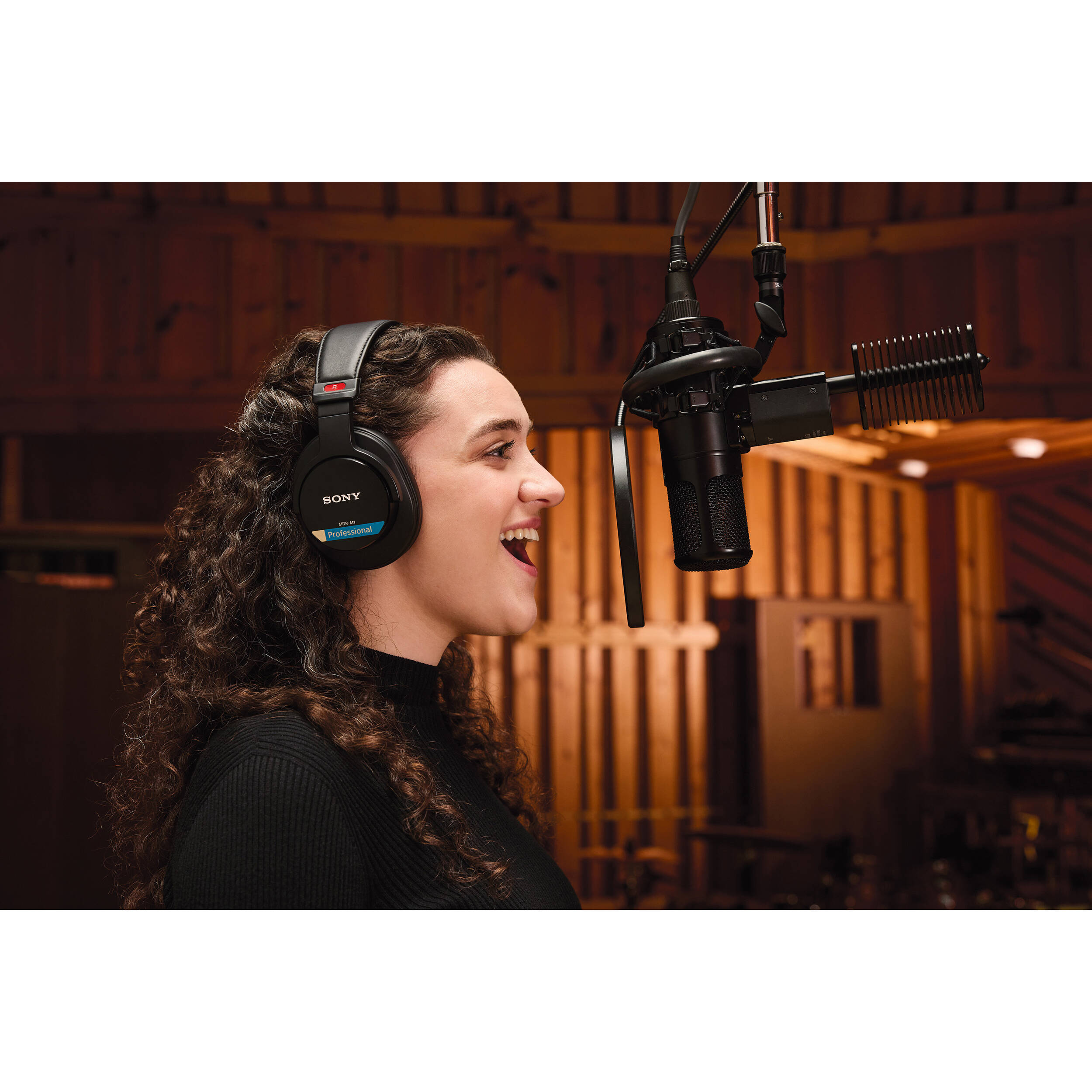 Sony MDR-M1 studio headphones with over-ear design, black finish, and adjustable headband for professional audio monitoring.