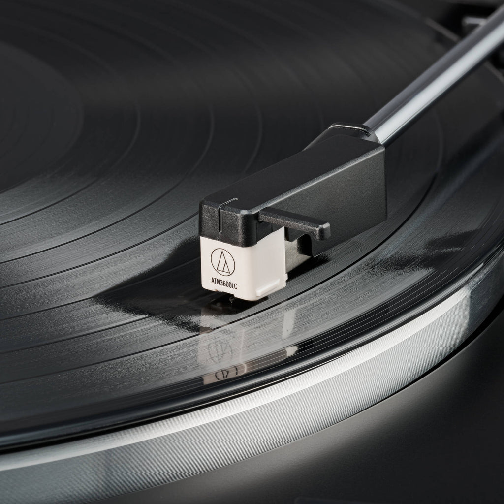 Audio-Technica ATN3600LC turntable stylus shown resting on a white background, highlighting its slim, precision-designed tip.