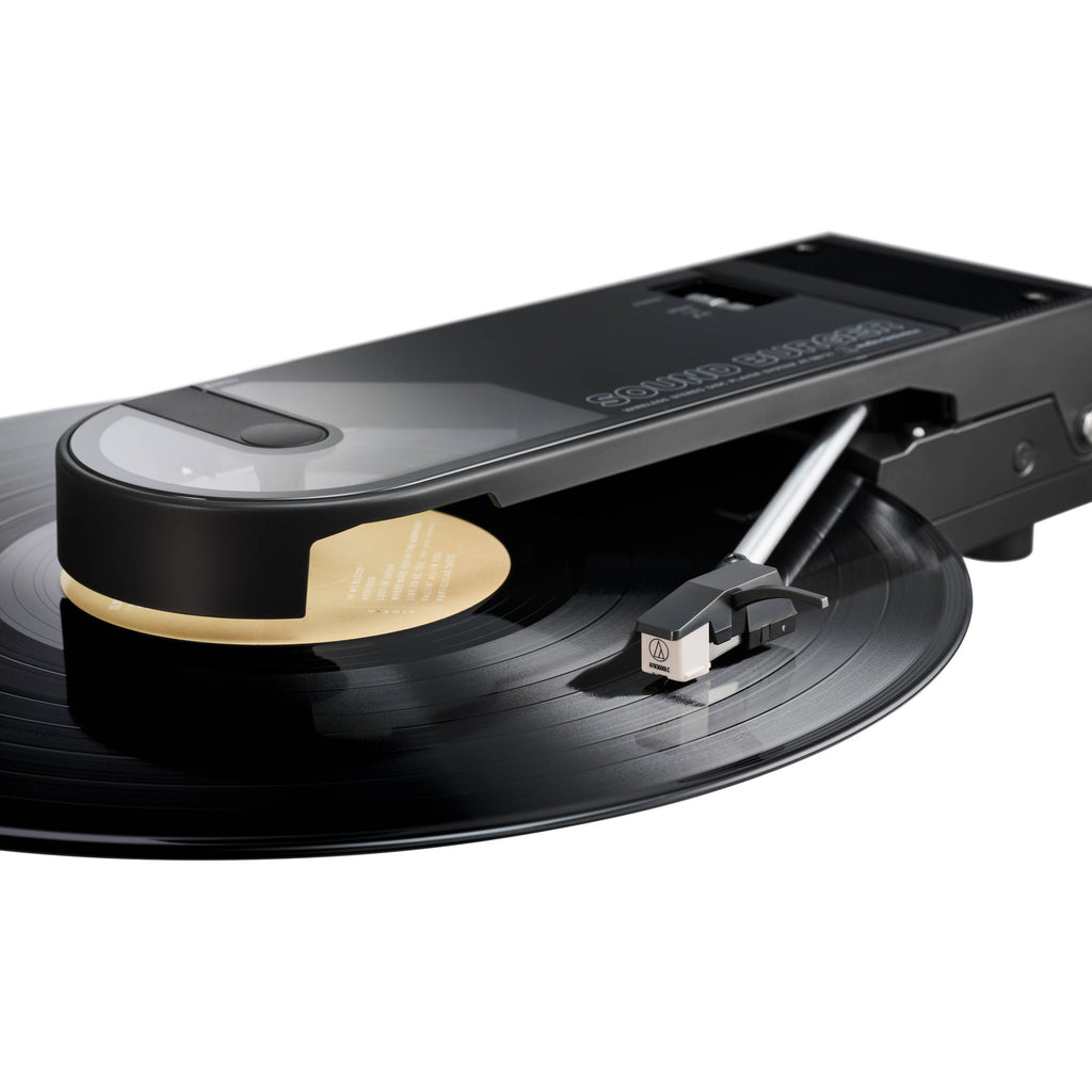 Audio Technica ATN3600LC turntable stylus resting on a record with a clear view of the stylus tip and cartridge.