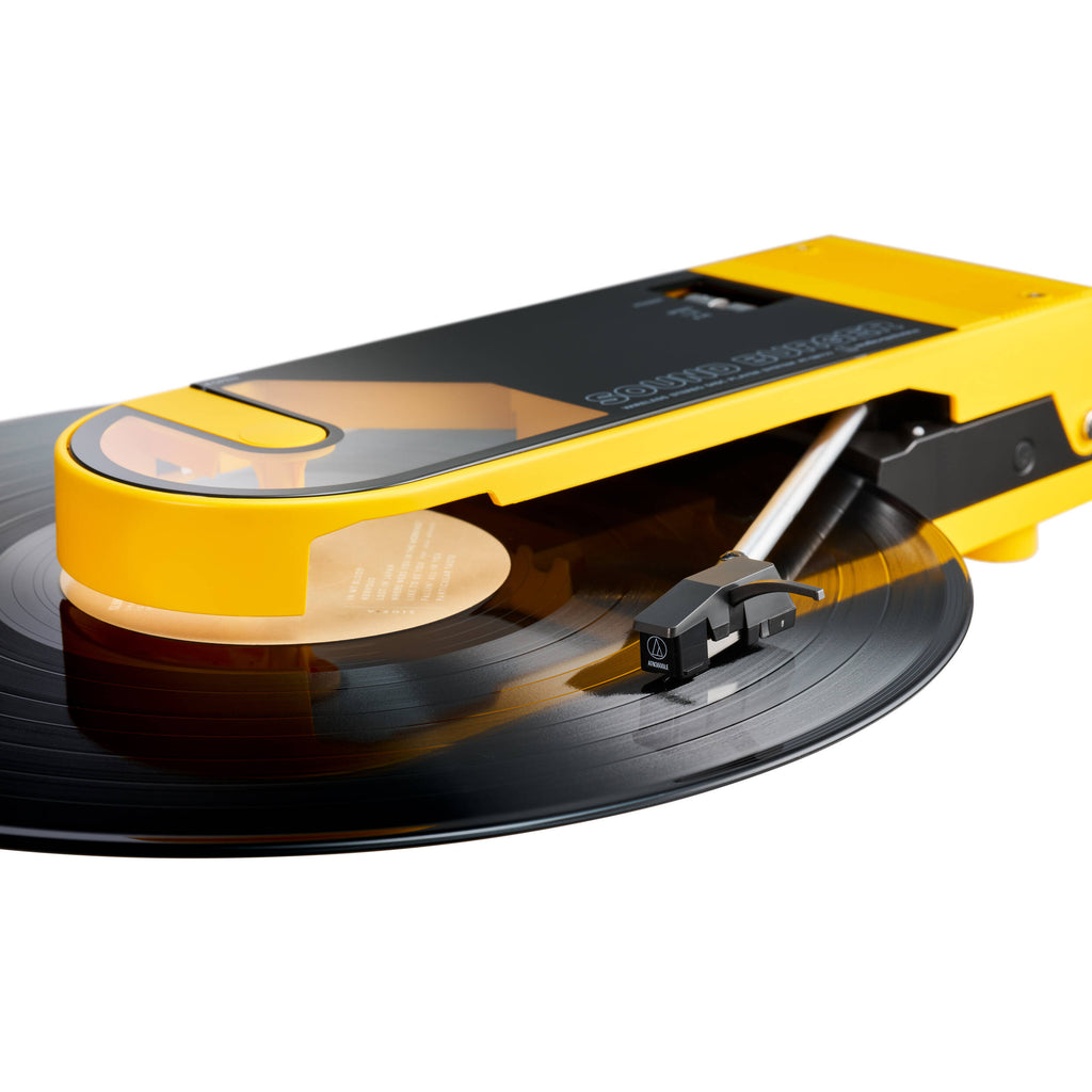 Audio Technica ATN3600LE turntable stylus resting on a record with a close-up view of the stylus tip and cartridge.